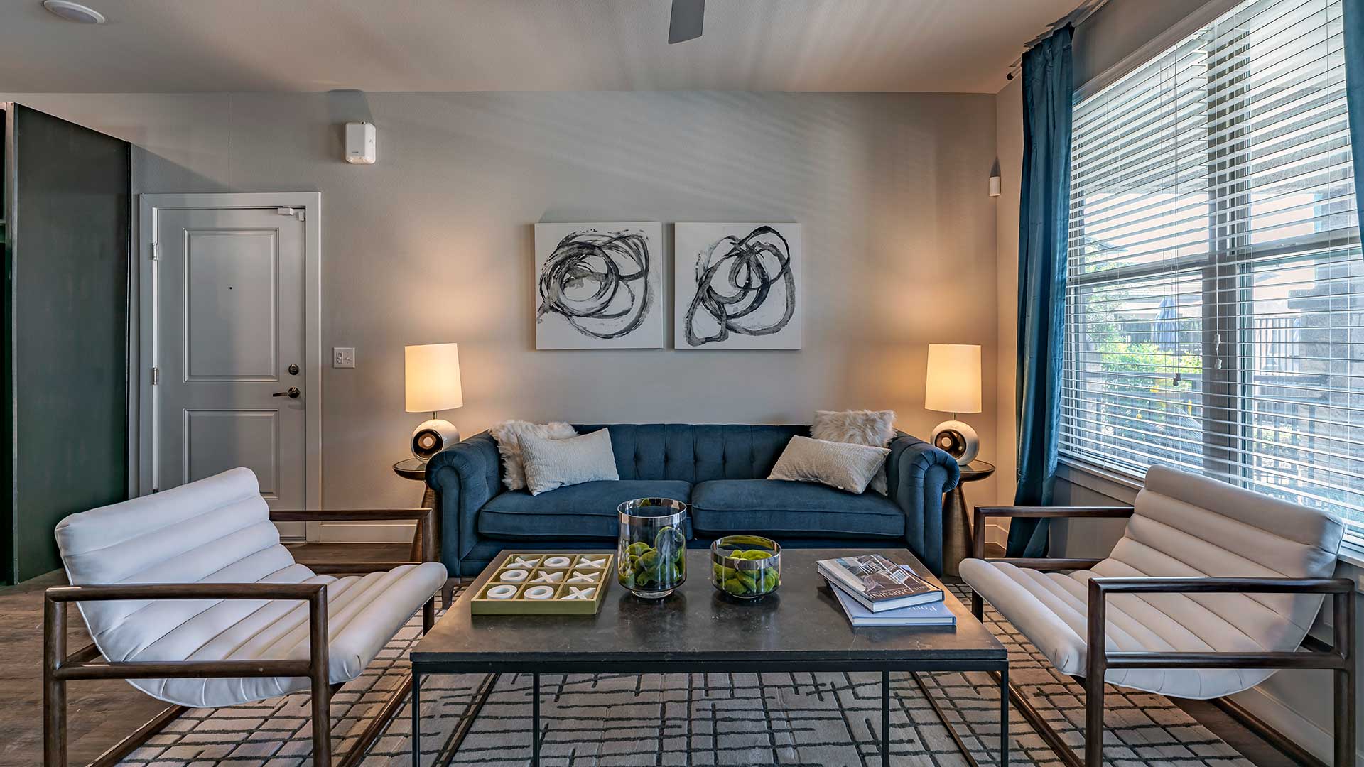 Furnished apartment living area shown — representative home at Senita on Cave Creek.